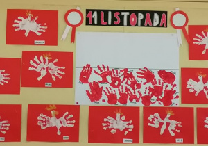 Prezentacja wykonanych przez dzieci prac związanych z Dniem Niepodległości. Dzieci wykonały flagę Polski i godło z odcisków.